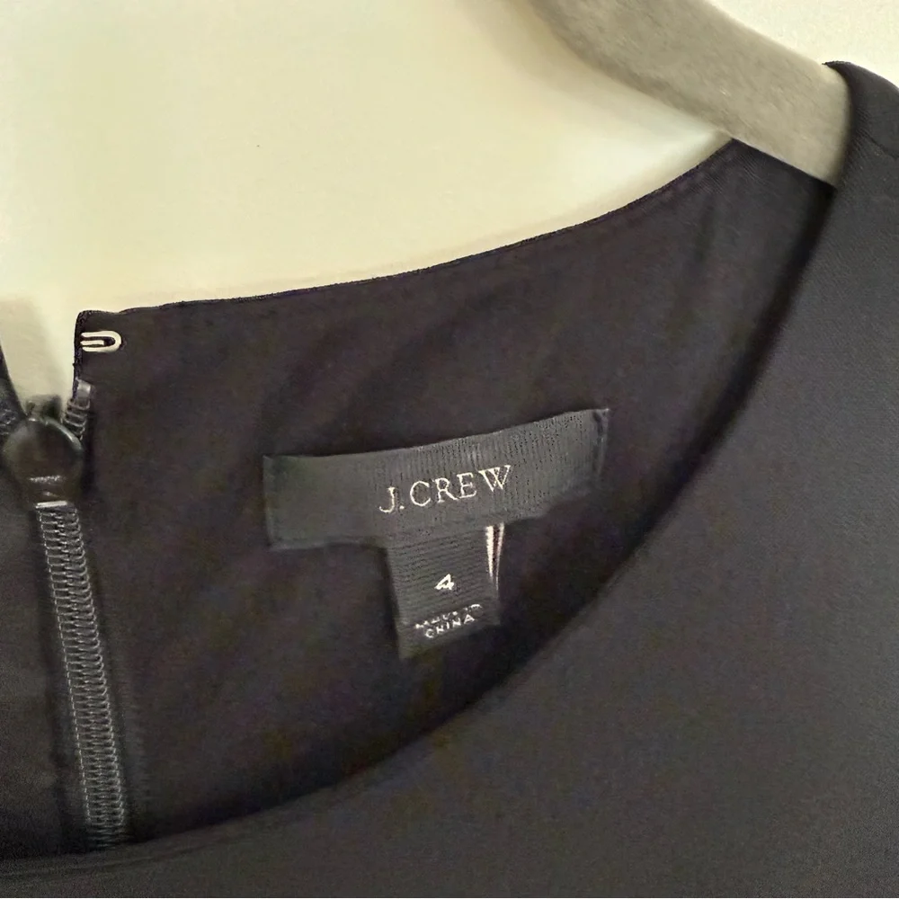 J. Crew Elegant Black Resume Dress. Pockets, back vent and zipper. Sleeveless.